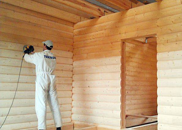 Обработка дома из бруса после постройки снаружи