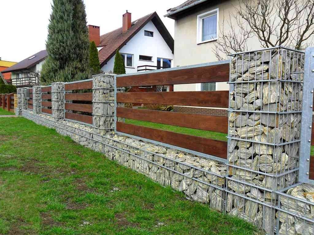 Забор из камня (51 фото): каменное ограждение с сеткой, ворота из декоративного бута и дикого «француза» для частных домов