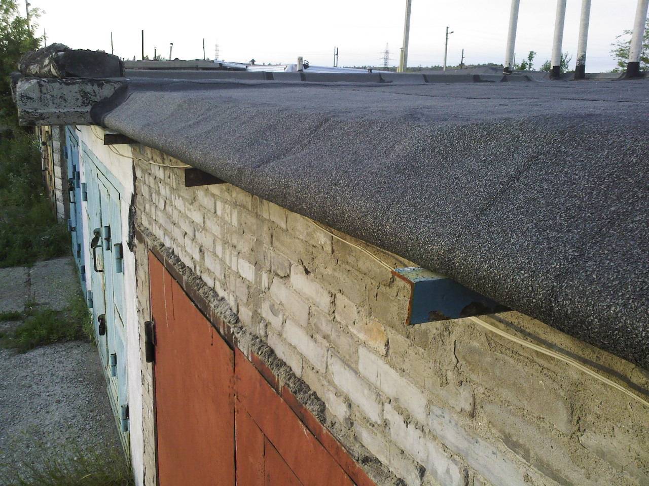 Крыша на гараж своими руками: конструкция материал